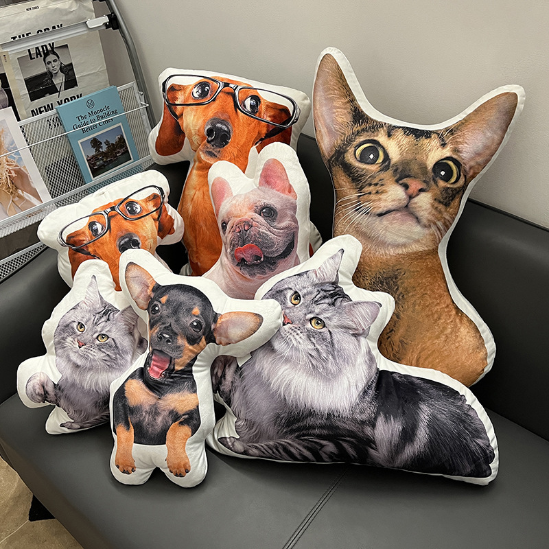 Collection of custom photo pillows arranged on a sofa